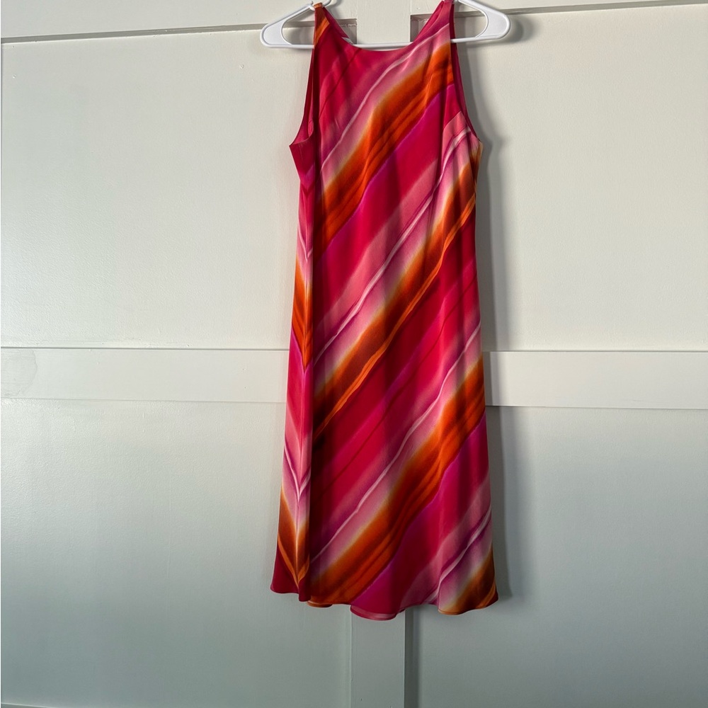 Bright, colorful dress.  Perfect for a cruise.  Packs beautifully.  Size 8